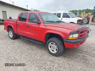 2002 Dodge Dakota Sport with VIN 1B7HG38N62S670613, listed as a IAAI auction lot 42133366 with 156,977 mi miles and . Bid and sale history available at carsss.com. Image 1.