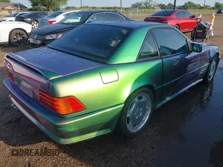 1990 Mercedes-Benz 500 z VIN WDBFA66E7LF005953, wystawiony jako IAAI lot #42224846 z przebiegiem 87 388 mil mil oraz . Historia ofert i sprzedaży dostępna na DreamBid. Obrazek 4.