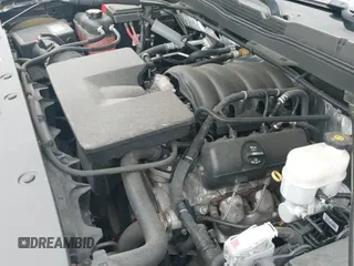 2015 Chevrolet Silverado 1500 LT z VIN 1GCNKREH6FZ355973, wystawiony jako IAAI lot #42359434 z przebiegiem 118 325 mil mil oraz . Historia ofert i sprzedaży dostępna na DreamBid. Obrazek 24.
