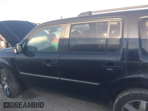 2013 Honda Pilot Touring with VIN 5FNYF4H96DB006582, listed as a IAAI auction lot 41722386 with 220,354 mi miles and . Bid and sale history available at carsss.com. Image 15.