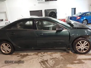 2006 Pontiac G6 6-Cyl z VIN 1G2ZG558664233613, wystawiony jako IAAI lot #41075907 z przebiegiem 228 361 mil mil oraz . Historia ofert i sprzedaży dostępna na DreamBid. Obrazek 13.
