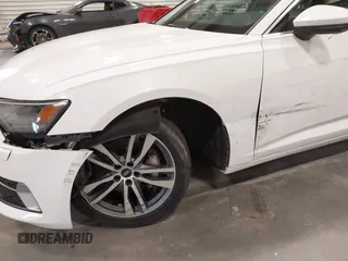 2023 Audi A6 Premium z VIN WAUD3BF24PN043215, wystawiony jako IAAI lot #42344302 z przebiegiem 55 357 mil mil oraz . Historia ofert i sprzedaży dostępna na DreamBid. Obrazek 6.