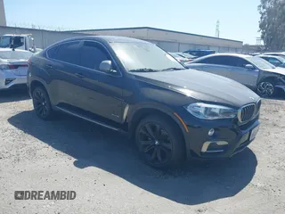 2019 BMW X6 sDrive35i z VIN 5UXKU0C54K0S97490, wystawiony jako IAAI lot #42034613 z przebiegiem Nie podano mil oraz . Historia ofert i sprzedaży dostępna na DreamBid. Obrazek 1.