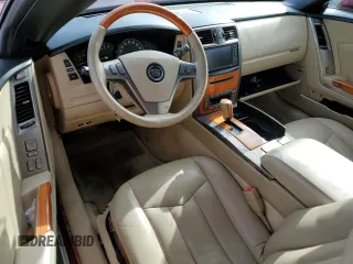 2007 Cadillac XLR z VIN 1G6YV36A575601135, wystawiony jako Copart lot #75123444 z przebiegiem Nie podano mil oraz Szkody całkowita. Historia ofert i sprzedaży dostępna na DreamBid. Obrazek 8.