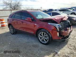 2021 Cadillac XT5 AWD Sport with VIN 1GYKNGRS1MZ229225, listed as a Copart auction lot 88223635 with 80,134 mi miles and Salvage title. Bid and sale history available at DreamBid. Image 4.
