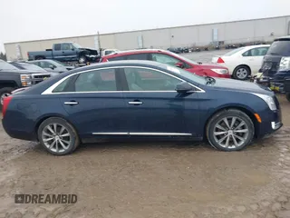 2013 Cadillac XTS Luxury with VIN 2G61P5S3XD9196239, listed as a IAAI auction lot 41205081 with 161,885 mi miles and . Bid and sale history available at carsss.com. Image 13.