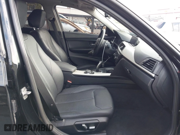 2016 BMW 3 Series 320i with VIN WBA8E1G52GNU11325, listed as a IAAI auction lot 42058241 with 104,596 mi miles and . Bid and sale history available at carsss.com. Image 5.