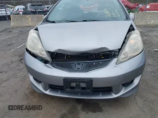 2009 Honda Fit Sport with VIN JHMGE88429S059170, listed as a IAAI auction lot 42091260 with 135,822 mi miles. Bid and sale history available at carsss.com. Image 6.