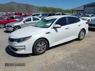 2016 Kia Optima LX z VIN 5XXGT4L3XGG080662, wystawiony jako IAAI lot #42048361 z przebiegiem 99 564 mil mil oraz . Historia ofert i sprzedaży dostępna na DreamBid. Obrazek 2.