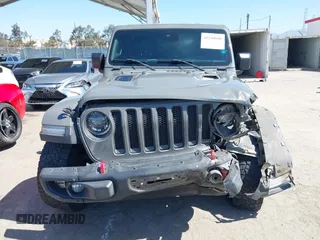 2019 Jeep Wrangler Unlimited Rubicon with VIN 1C4HJXFN6KW547401, listed as a IAAI auction lot 42250698 with 103,910 mi miles and . Bid and sale history available at DreamBid. Image 12.