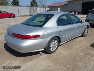 1999 Mercury Sable GS with VIN 1MEFM50U0XG609913, listed as a IAAI auction lot 41783308 with 80,022 mi miles. Bid and sale history available at carsss.com. Image 4.