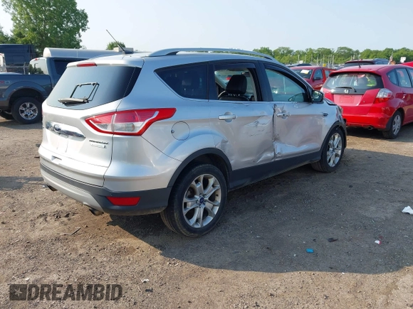 2015 Ford Escape Titanium z VIN 1FMCU0J90FUC02039, wystawiony jako IAAI lot #42369882 z przebiegiem 156 287 mil mil oraz . Historia ofert i sprzedaży dostępna na DreamBid. Obrazek 4.