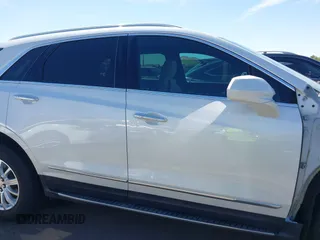 2019 Cadillac XT5 FWD with VIN 1GYKNARS1KZ135419, listed as a IAAI auction lot 41860022 with 63,395 mi miles and . Bid and sale history available at DreamBid. Image 14.