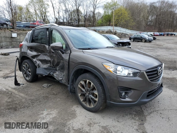 2016 Mazda CX-5 Grand Touring with VIN JM3KE4DY5G0848717, listed as a Copart auction lot 53249895 with 86,746 mi miles and Salvage Title. Bid and sale history available at carsss.com. Image 4.