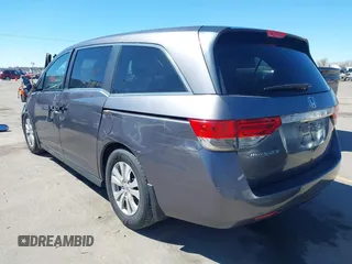 2015 Honda Odyssey EX-L with VIN 5FNRL5H66FB063215, listed as a IAAI auction lot 41846532 with 153,048 mi miles and . Bid and sale history available at carsss.com. Image 3.