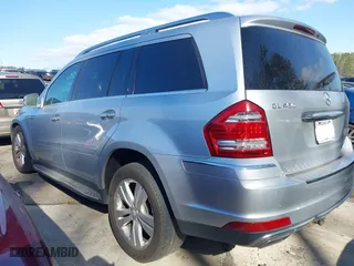 2011 Mercedes-Benz GL-Class GL 450 with VIN 4JGBF7BE1BA660453, listed as a IAAI auction lot 41852431 with 143,084 mi miles. Bid and sale history available at carsss.com. Image 3.