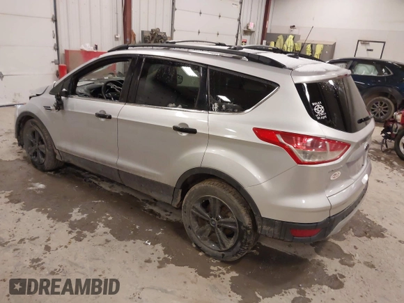 2014 Ford Escape SE z VIN 1FMCU9GX1EUD67624, wystawiony jako IAAI lot #41986362 z przebiegiem 79 921 mil mil oraz . Historia ofert i sprzedaży dostępna na DreamBid. Obrazek 3.
