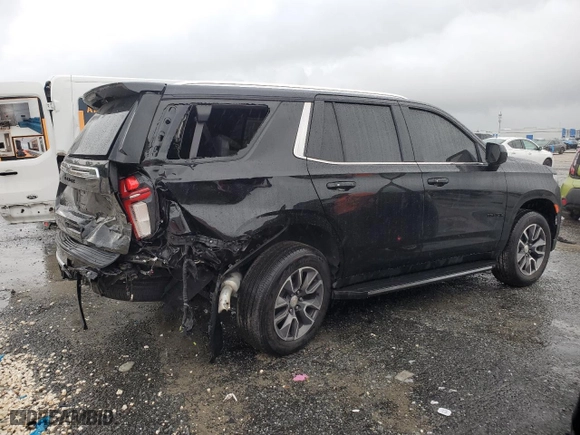 2021 Chevrolet Tahoe LS with VIN 1GNSCMKD4MR335973, listed as a Copart auction lot 69972594 with 42,129 mi miles and Salvage Title. Bid and sale history available at carsss.com. Image 3.