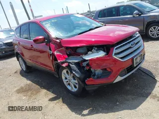 2017 Ford Escape SE z VIN 1FMCU9GD2HUD27367, wystawiony jako IAAI lot #42266185 z przebiegiem 108 575 mil mil oraz . Historia ofert i sprzedaży dostępna na DreamBid. Obrazek 1.