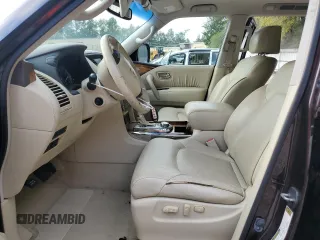 2011 Infiniti QX56 7-passenger with VIN JN8AZ2NE9B9006134, listed as a Copart auction lot 69789604 with 135,786 mi miles and Salvage Title. Bid and sale history available at carsss.com. Image 7.