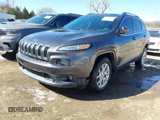 2016 Jeep Cherokee 75th Anniversary with VIN 1C4PJLCB2GW160141, listed as a IAAI auction lot 41748822 with 87,411 mi miles. Bid and sale history available at carsss.com. Image 2.