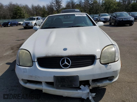 1999 Mercedes-Benz SLK-Class with VIN WDBKK47F9XF130501, listed as a Copart auction lot 71770824 with 124,669 mi miles and Clean Title. Bid and sale history available at carsss.com. Image 5.