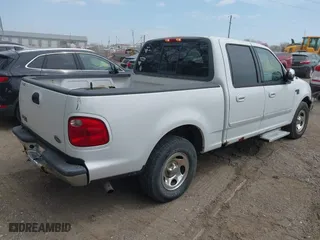 2001 Ford F-150 SuperCrew XLT with VIN 1FTRW07LX1KA24415, listed as a IAAI auction lot 42081030 with 298,673 mi miles. Bid and sale history available at carsss.com. Image 4.