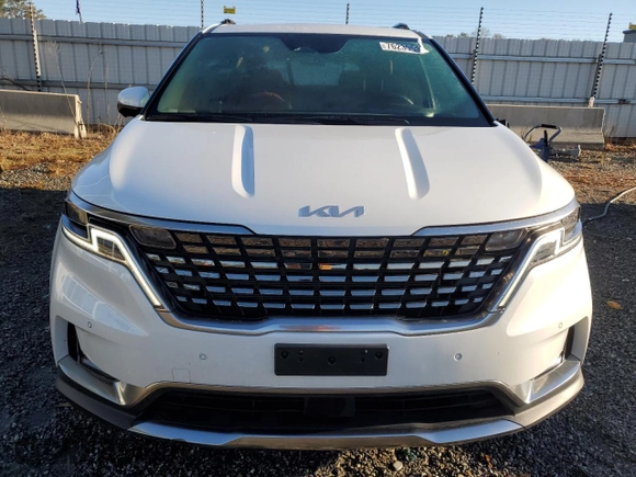 2023 Kia Carnival SX with VIN KNDNE5H34P6222597, listed as a Copart auction lot 76239534 with 17,817 mi miles and Salvage Title. Bid and sale history available at carsss.com. Image 5.