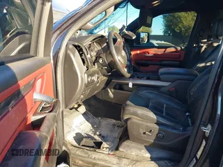 2019 Ram 1500 Rebel z VIN 1C6SRFLT2KN900600, wystawiony jako IAAI lot #41307832 z przebiegiem 74 481 mil mil oraz . Historia ofert i sprzedaży dostępna na DreamBid. Obrazek 5.