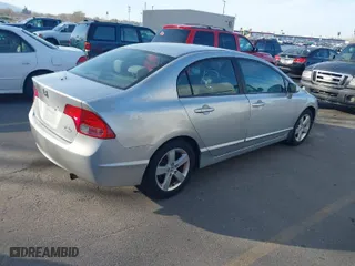 2007 Honda Civic Sdn EX with VIN 1HGFA16807L069520, listed as a IAAI auction lot 41957002 with 135,990 mi miles. Bid and sale history available at carsss.com. Image 4.