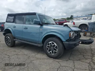 2023 Ford Bronco z VIN 1FMEE5DP9PLB17477, wystawiony jako Copart lot #58829615 z przebiegiem 22 069 mil mil oraz Szkoda całkowita • Salvage title. Historia ofert i sprzedaży dostępna na DreamBid. Obrazek 4.