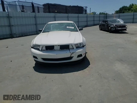 2012 Ford Mustang Premium with VIN 1ZVBP8AM0C5283038, listed as a Copart auction lot 58961615 with 140,727 mi miles and Salvage title. Bid and sale history available at DreamBid. Image 13.