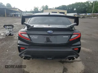 2023 Subaru WRX Premium z VIN JF1VBAF63P9821154, wystawiony jako Copart lot #61098765 z przebiegiem Nie podano mil oraz Szkoda całkowita • Salvage title. Historia ofert i sprzedaży dostępna na DreamBid. Obrazek 6.