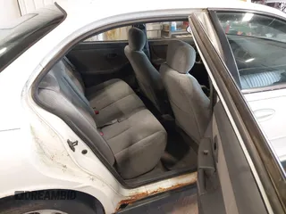 1999 Oldsmobile Intrigue GX z VIN 1G3WH52K6XF328030, wystawiony jako IAAI lot #42334804 z przebiegiem Nie podano mil oraz . Historia ofert i sprzedaży dostępna na DreamBid. Obrazek 8.