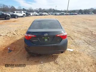2016 Toyota Corolla L z VIN 5YFBURHE1GP398787, wystawiony jako IAAI lot #41667240 z przebiegiem 128 144 mil mil oraz . Historia ofert i sprzedaży dostępna na DreamBid. Obrazek 16.