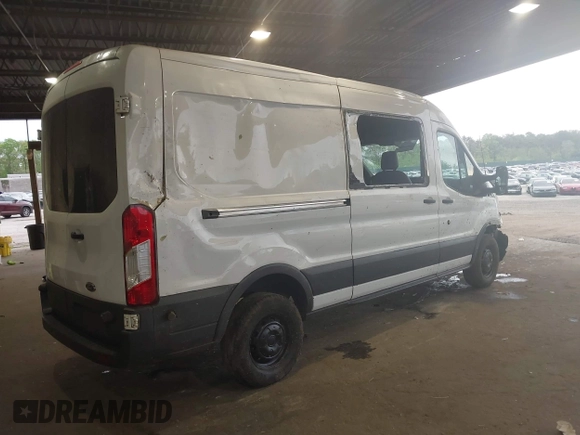 2015 Ford Transit Cargo z VIN 1FTNR2CM1FKA40154, wystawiony jako IAAI lot #42210986 z przebiegiem 164 324 mil mil oraz . Historia ofert i sprzedaży dostępna na DreamBid. Obrazek 4.