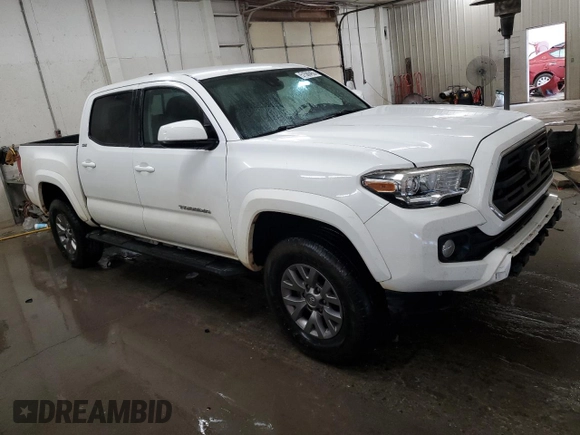 2018 Toyota Tacoma SR5 with VIN 3TMAZ5CN7JM074058, listed as a Copart auction lot 51586455 with 117,877 mi miles and Salvage Title. Bid and sale history available at DreamBid. Image 4.