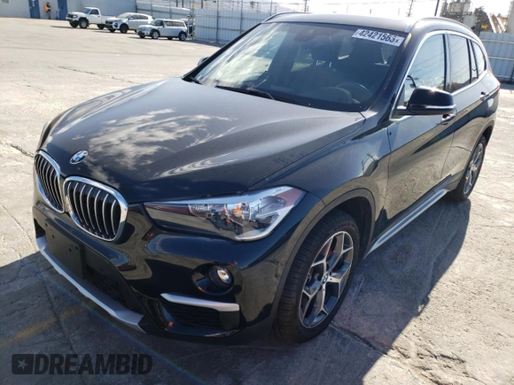 2019 BMW X1 sDrive28i with VIN WBXHU7C52K3H45282, listed as a Copart auction lot 42421563 with 8,057 mi miles. Bid and sale history available at carsss.com. Image 1.