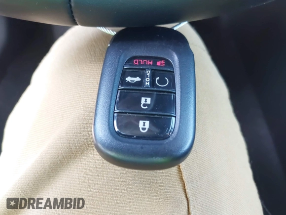 2023 Honda Civic EX with VIN 2HGFE1F73PH320247, listed as a IAAI auction lot 42148175 with 40,454 mi miles and . Bid and sale history available at DreamBid. Image 11.