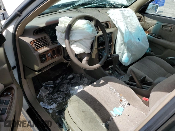 2000 Toyota Camry CE с VIN JT2BG22K1Y0403018, выставлен на аукционе Copart как лот 58325535 с пробегом Не указан миль и На запчасти • Non repairable. История ставок и продаж доступна на DreamBid. Изображение 8.