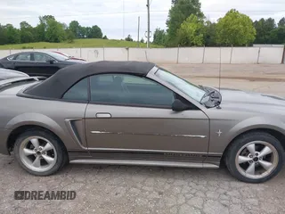 2001 Ford Mustang Deluxe z VIN 1FAFP44411F159656, wystawiony jako IAAI lot #42123128 z przebiegiem 191 814 mil mil oraz . Historia ofert i sprzedaży dostępna na DreamBid. Obrazek 14.