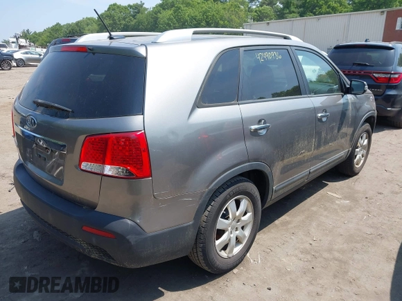 2013 Kia Sorento LX with VIN 5XYKT3A64DG363258, listed as a IAAI auction lot 42490986 with 215,694 mi miles and . Bid and sale history available at DreamBid. Image 4.