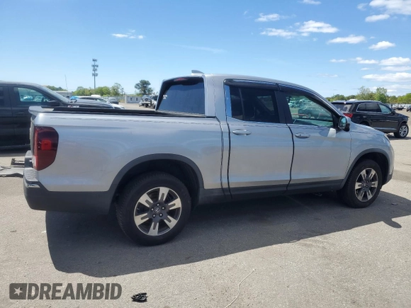 2017 Honda Ridgeline RTL-T with VIN 5FPYK3F65HB012868, listed as a Copart auction lot 57562885 with 115,530 mi miles and Salvage title. Bid and sale history available at DreamBid. Image 3.