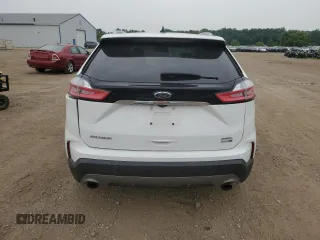 2020 Ford Edge SEL z VIN 2FMPK4J95LBB21392, wystawiony jako Copart lot #60912275 z przebiegiem 82 527 mil mil oraz Szkoda całkowita • Salvage title. Historia ofert i sprzedaży dostępna na DreamBid. Obrazek 6.