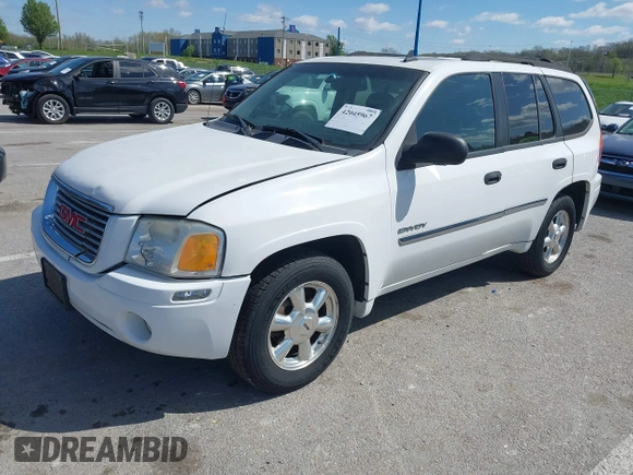 2006 GMC Envoy SLE with VIN 1GKDT13SX62258586, listed as a IAAI auction lot 42045967 with 143,225 mi miles. Bid and sale history available at carsss.com. Image 2.