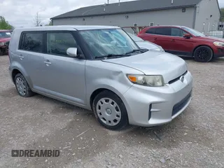 2012 Scion xB with VIN JTLZE4FE5CJ017513, listed as a IAAI auction lot 42088804 with 175,680 mi miles. Bid and sale history available at carsss.com. Image 1.