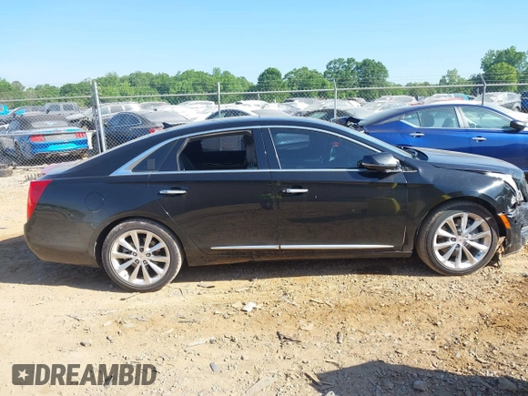 2014 Cadillac XTS Luxury with VIN 2G61M5S30E9229758, listed as a IAAI auction lot 42179952 with 125,848 mi miles and . Bid and sale history available at DreamBid. Image 13.