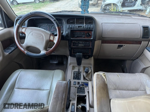 2001 Isuzu Trooper S z VIN JACDJ58X417J03071, wystawiony jako Copart lot #77033444 z przebiegiem 151 982 mil mil oraz Szkody całkowita. Historia ofert i sprzedaży dostępna na DreamBid. Obrazek 9.