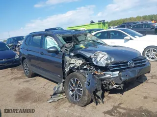 2021 Volkswagen Tiguan S with VIN 3VV1B7AX4MM074898, listed as a IAAI auction lot 40565377 with 1 mi miles. Bid and sale history available at carsss.com. Image 1.