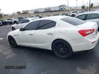 2014 Maserati Ghibli S Q4 with VIN ZAM57RTA3E1090350, listed as a IAAI auction lot 42056682 with 119,160 mi miles and . Bid and sale history available at DreamBid. Image 15.